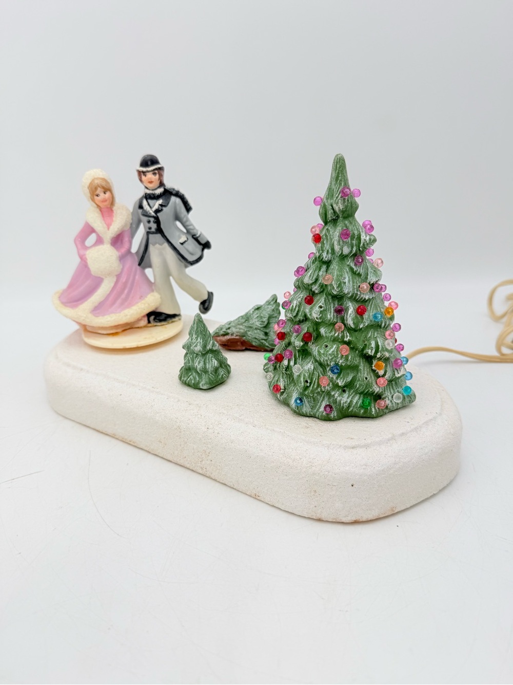 Vintage ceramic Christmas Tree Holiday Figurine with Skating Couple music box